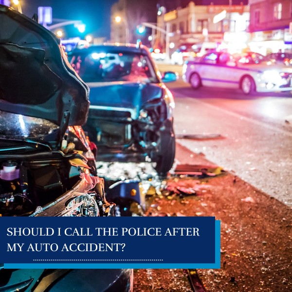 Police car arriving at the scene of an auto accident