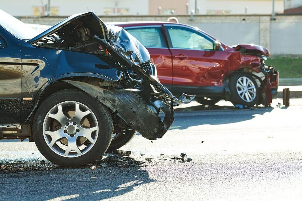 Car crash happening along the highway.